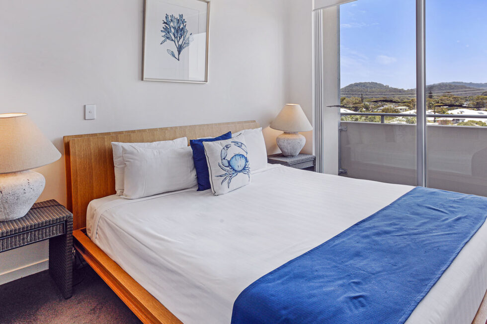 Pool View 2 Bedroom Apartment master bedroom with hinterland view